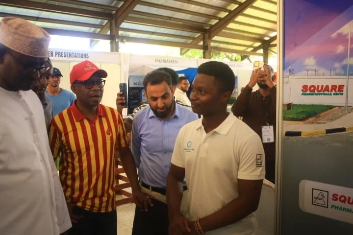 A presenter explains his research at the poster presentations of the 7th KAMMP Scientific Conference, 2025
